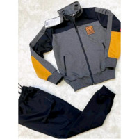 Костюм спортивный для мальчика арт.Т-0230 размер 30/116-42/158 трикотажный цвет черный/рыжий